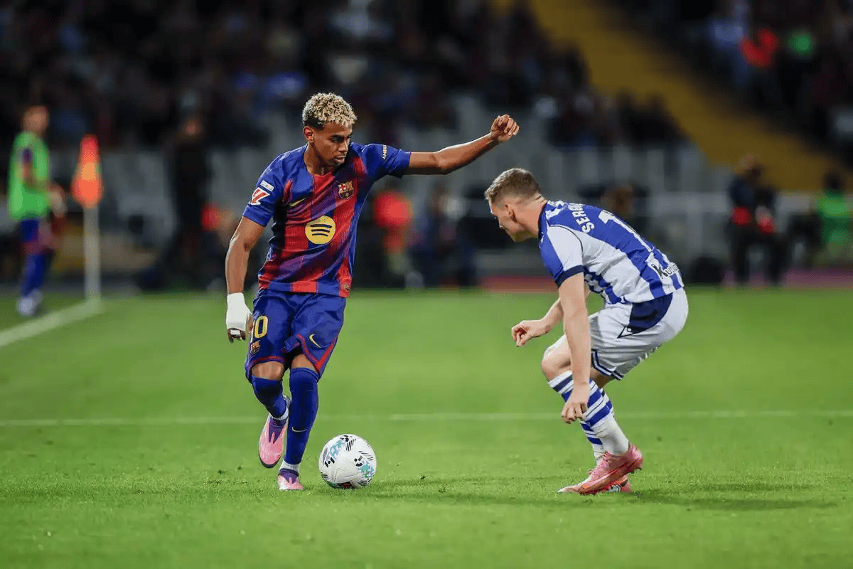 西甲巅峰对决:皇家社会主场阻击领头羊巴萨,复仇战一触即发!